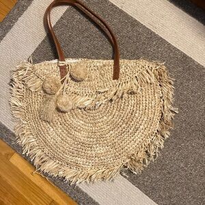 Beach gold straw bag with pom pom detail - from Anthropologie